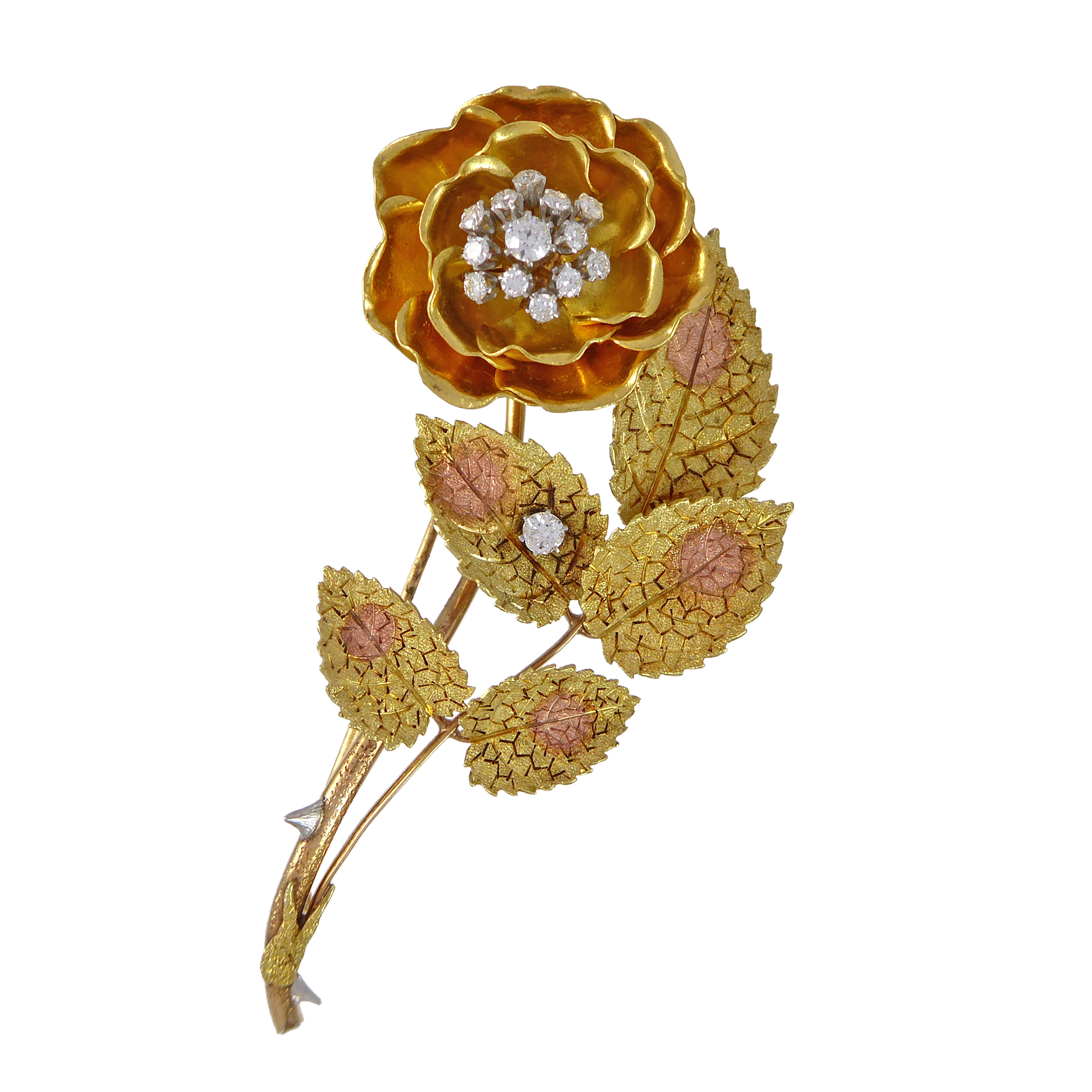 Two-colour gold and diamond rose spray brooch, naturalistically modelled, with a single open flowerhead,